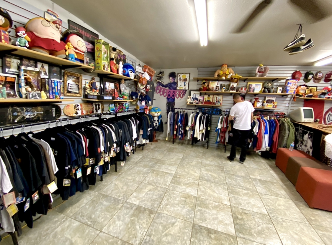 Interior overview of Lucky Bastard Vintage showing clothing racks and store layout