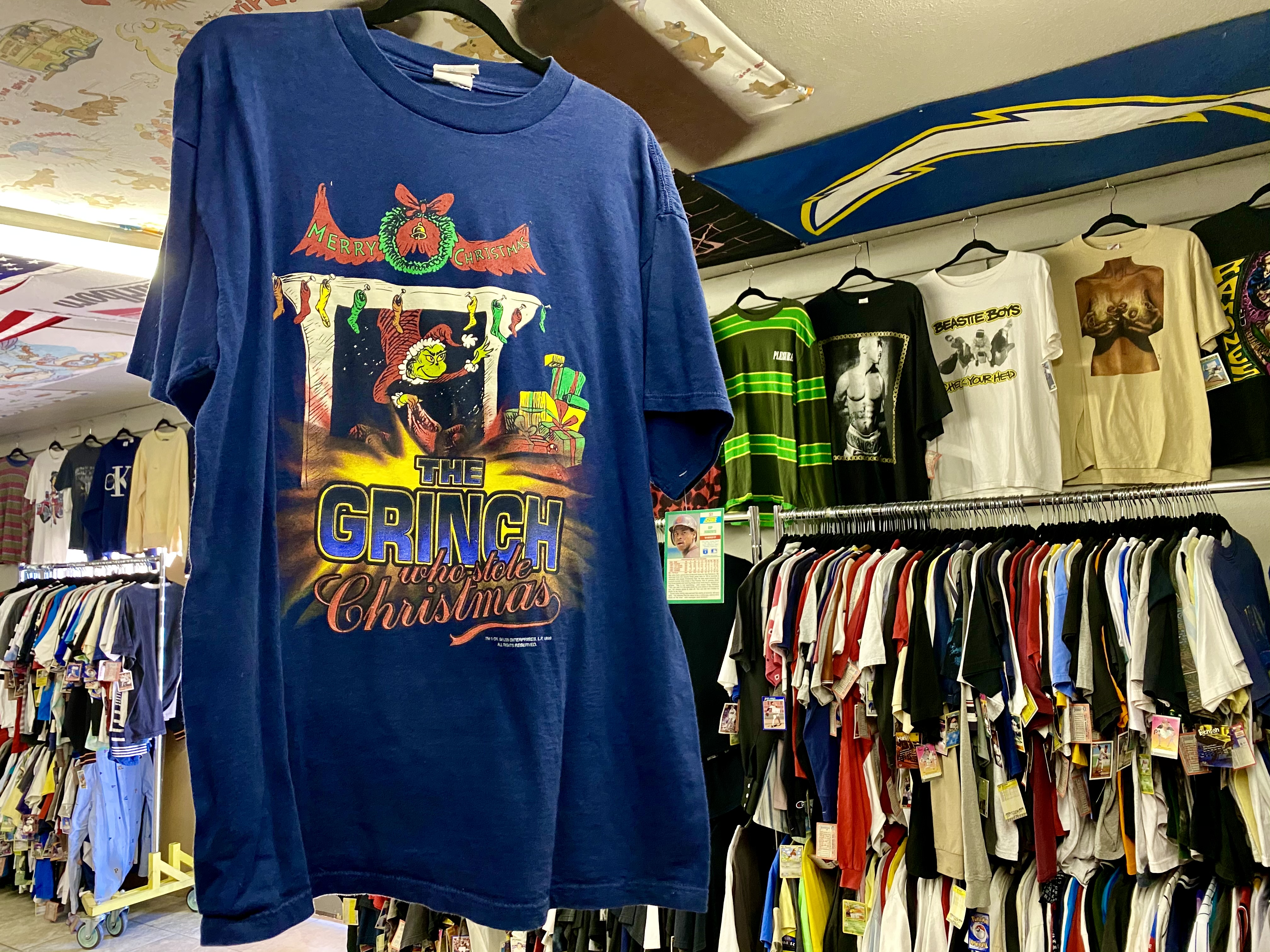 Curated vintage tees including pop culture and band merchandise